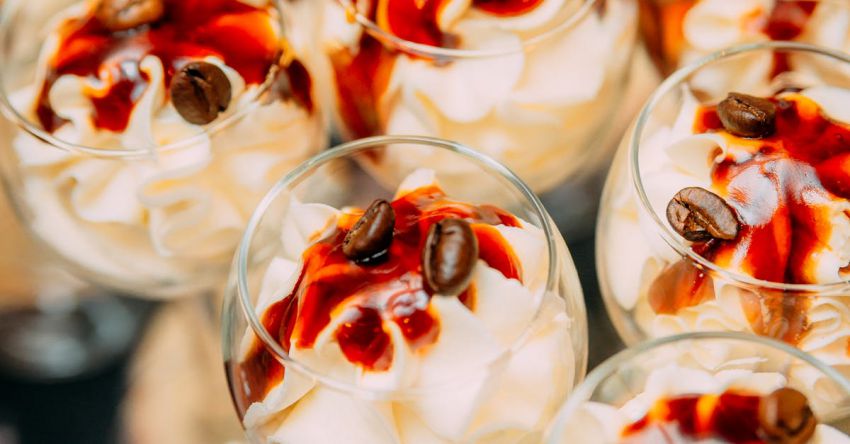 Coffee Tasting Party - Glass of delicious dessert with whipped cream