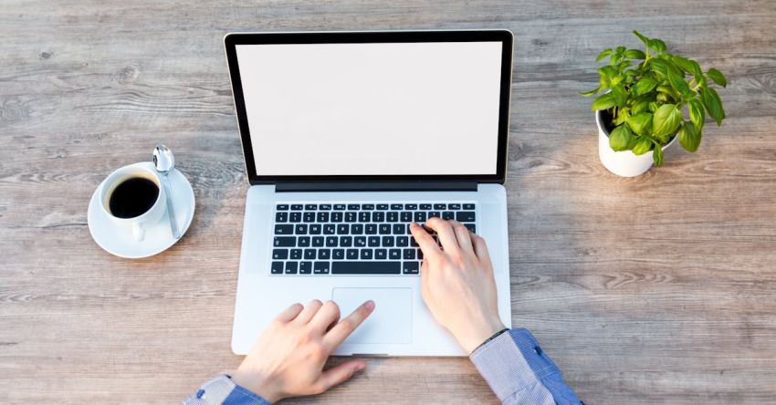 Summer Coffee Recipes - Person's Hand on Laptop