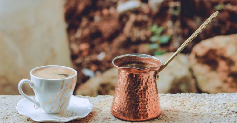 Turkish Coffee - White Tea Cup on Gray Surface