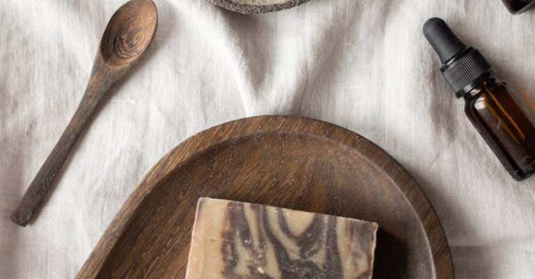 Organic Coffee - Handmade soaps and bowl with coffeee placed on table