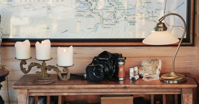 Coffee History - Vintage interior with old fashioned wooden desk and big map