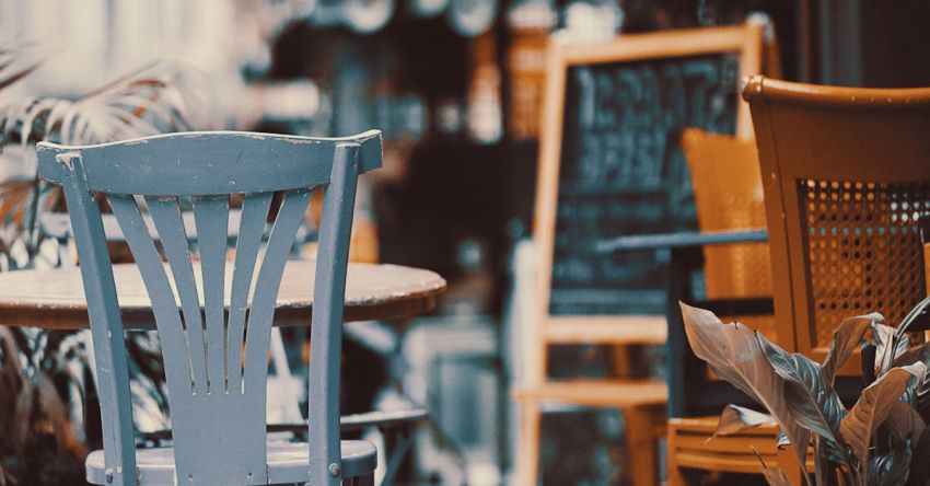 Table History - Chairs and Tables in Restaurant