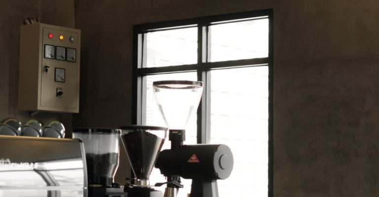 Coffee Makers - Coffee Makers Standing on a Cafe Counter