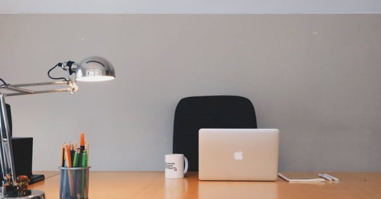 Office Table - Silver Apple Macbook on Brown Wooden Table